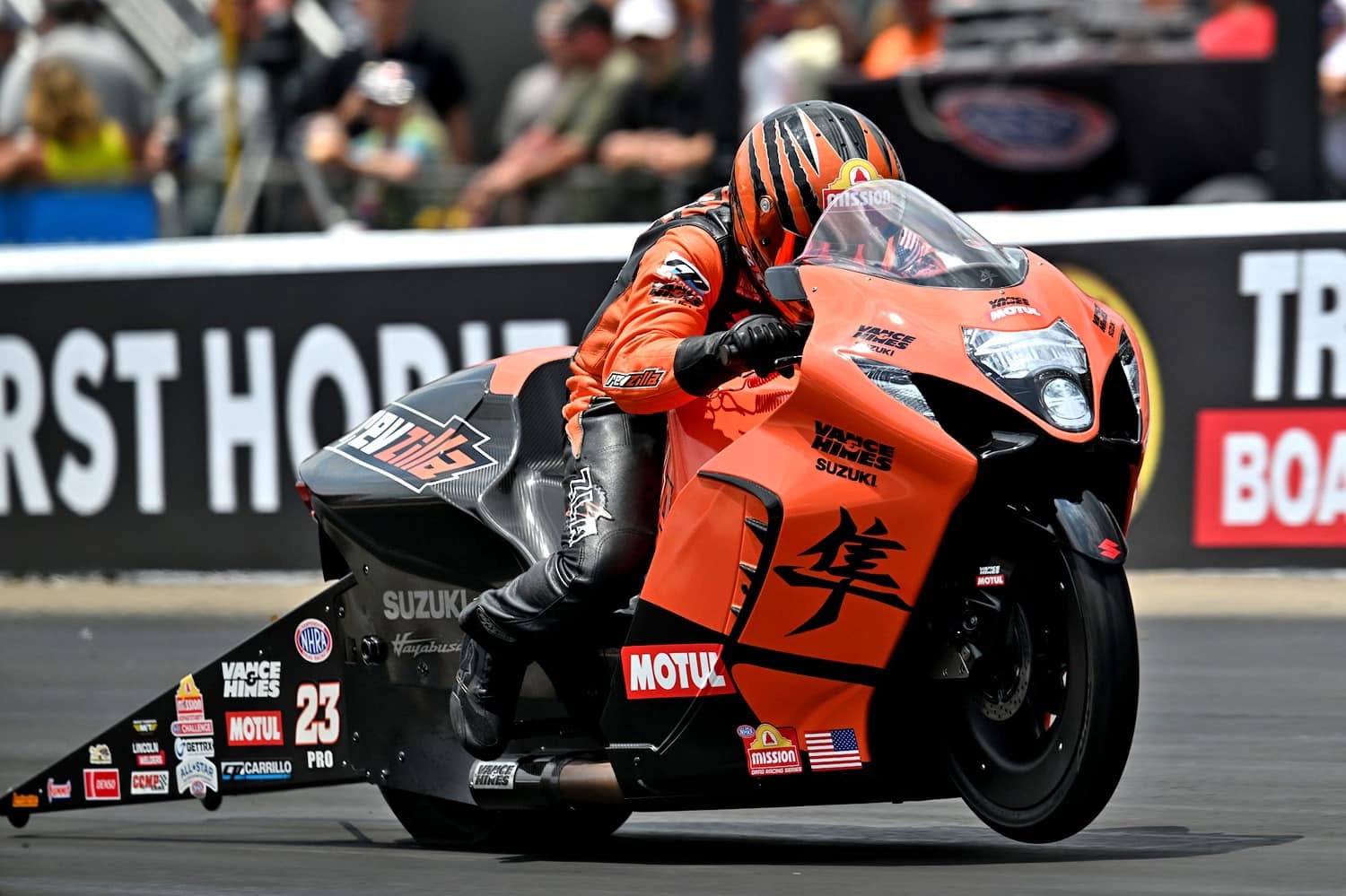 Gadson launching the orange RevZilla Vance & Hines Suzuki Hayabusa